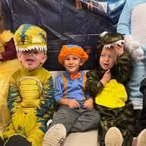 Children dressed up in costumes for a Happy Days celebration